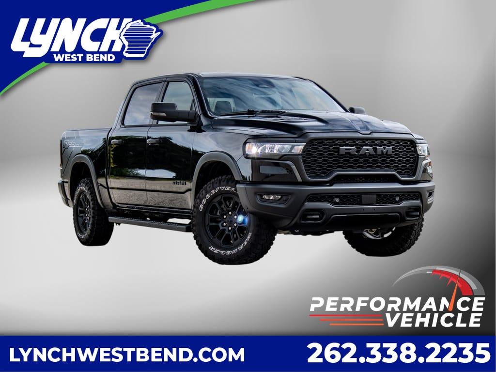 2025 RAM 1500 Rebel Crew Cab 4x4 5'7" Box in Black — front three-quarter view