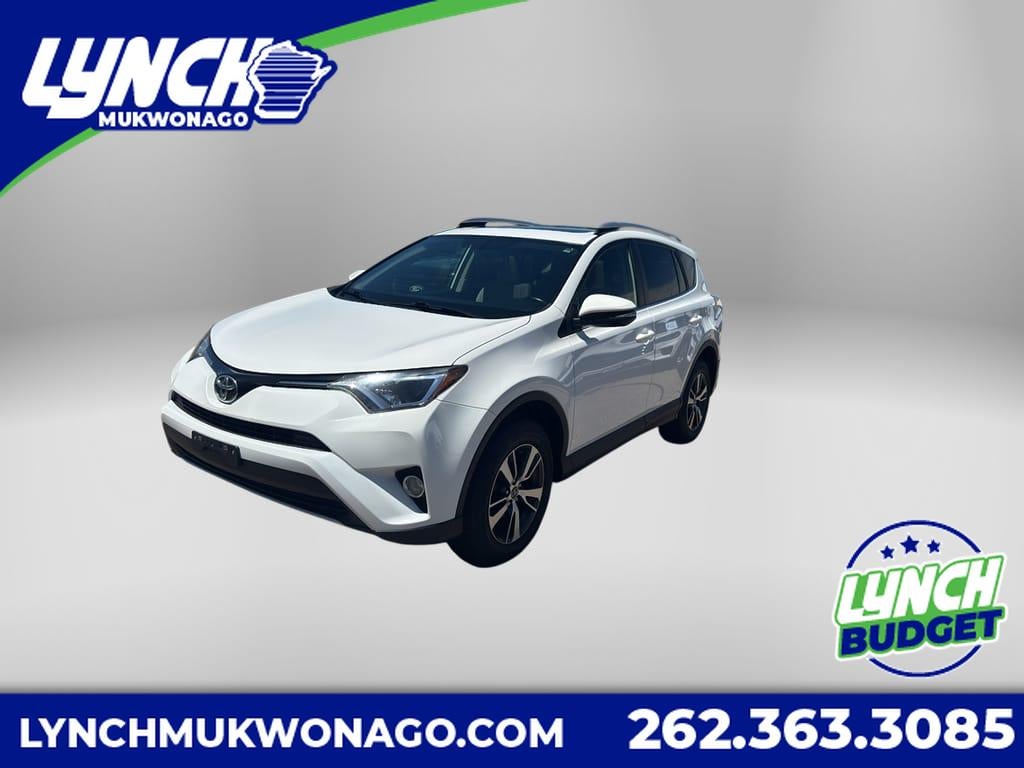 2016 Toyota RAV4 XLE in Super White — front three-quarter view
